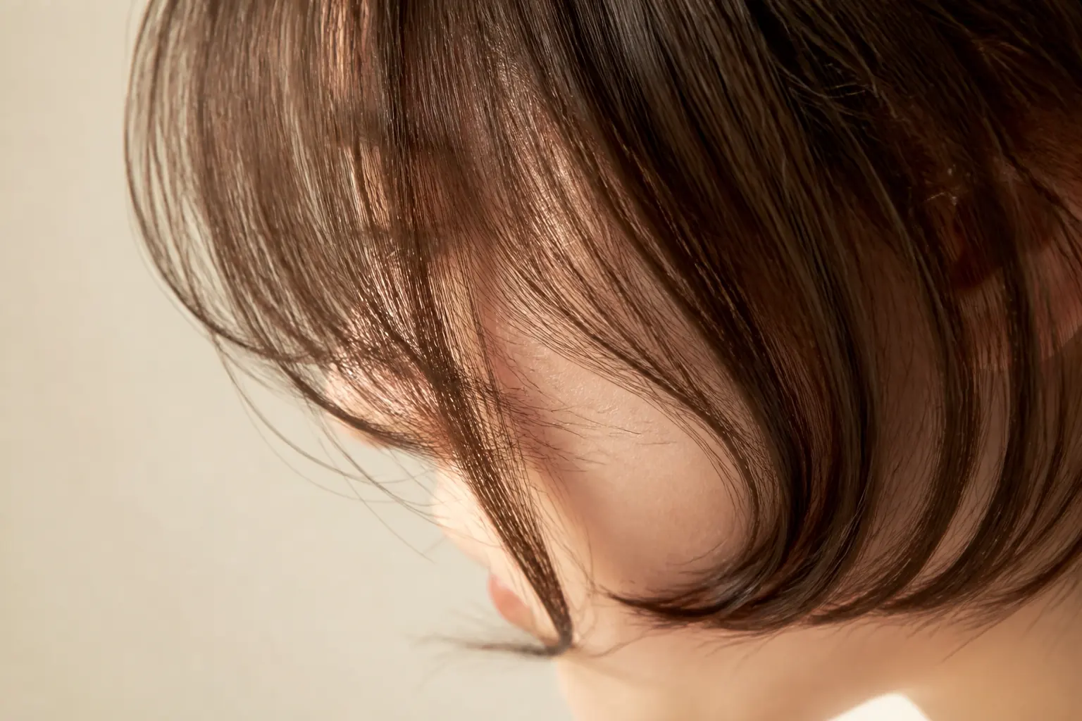 Close-up of fringe and hair-end texture on one hairstyle